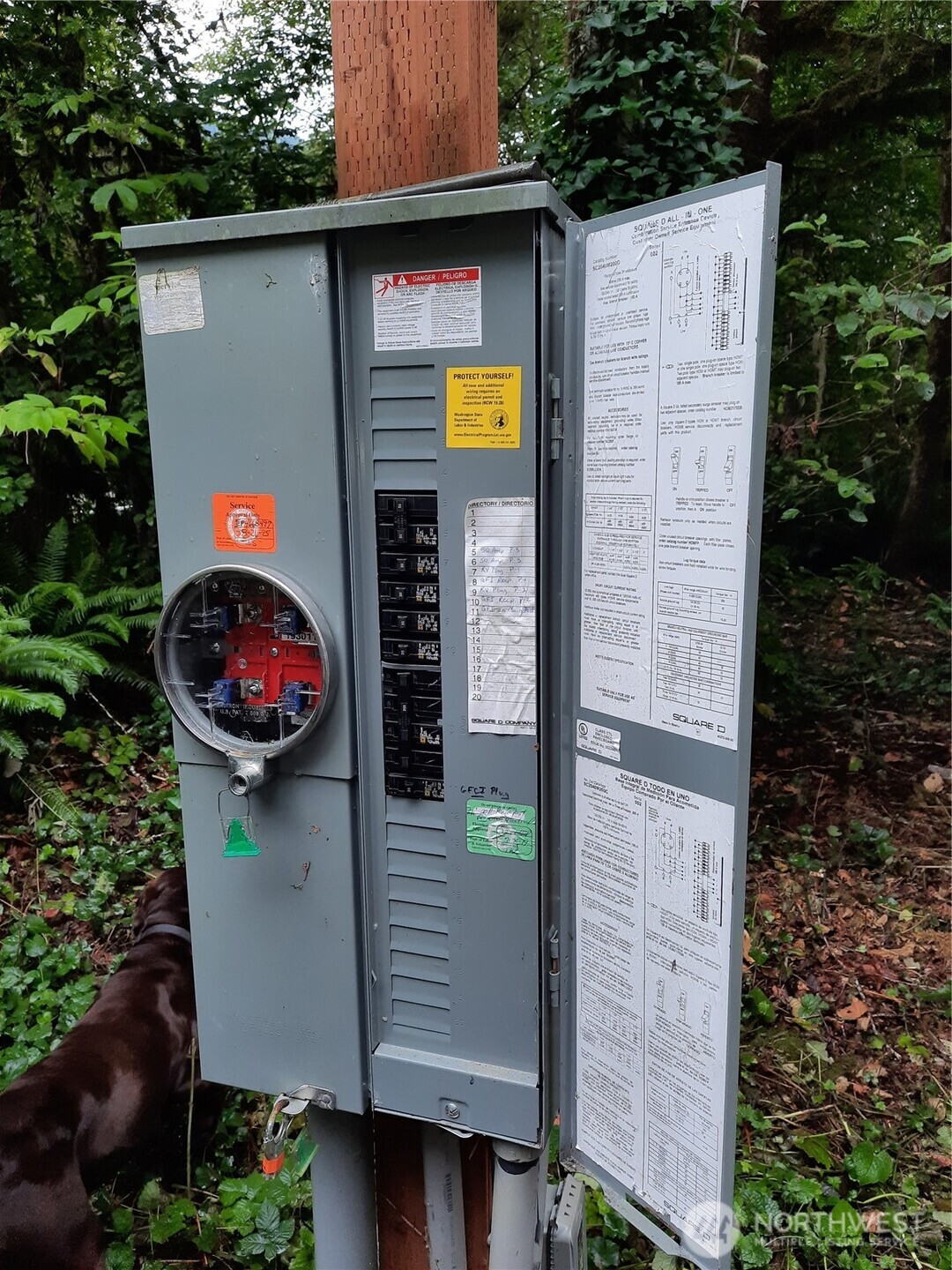 13816 White Falls Lane Concrete, WA 98237 - Photo 18 of 22 an aerial view of yellow house with sign board and yard