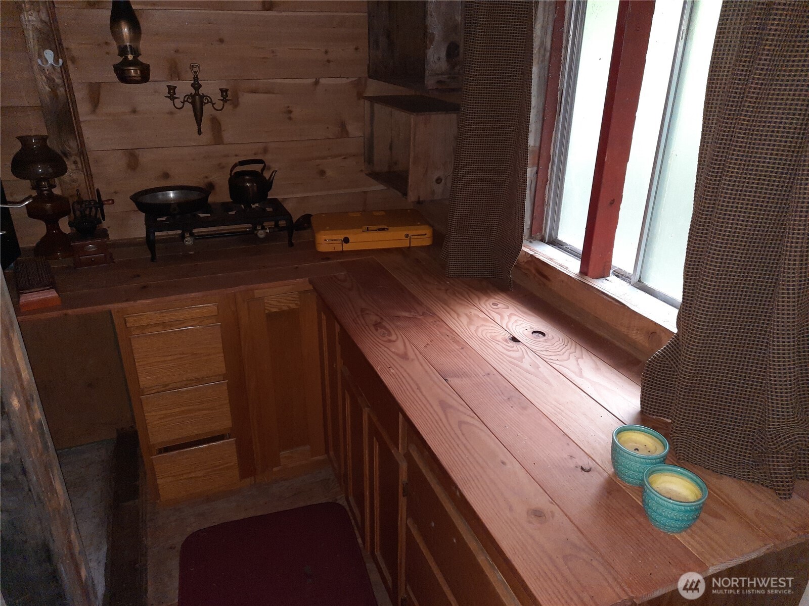 13816 White Falls Lane Concrete, WA 98237 - Photo 4 of 22 a bathroom with a granite countertop sink and a toilet