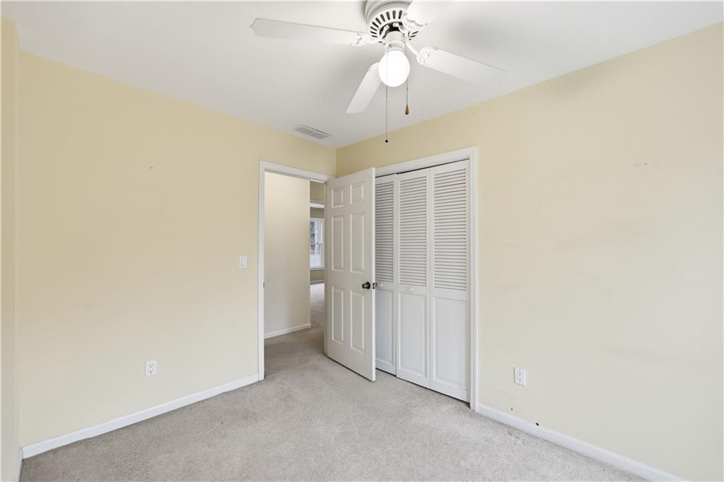 6500 Gaines Ferry Road, Unit I4 Flowery Branch, GA 30542 - Photo 25 of 29 an empty room with a bathroom