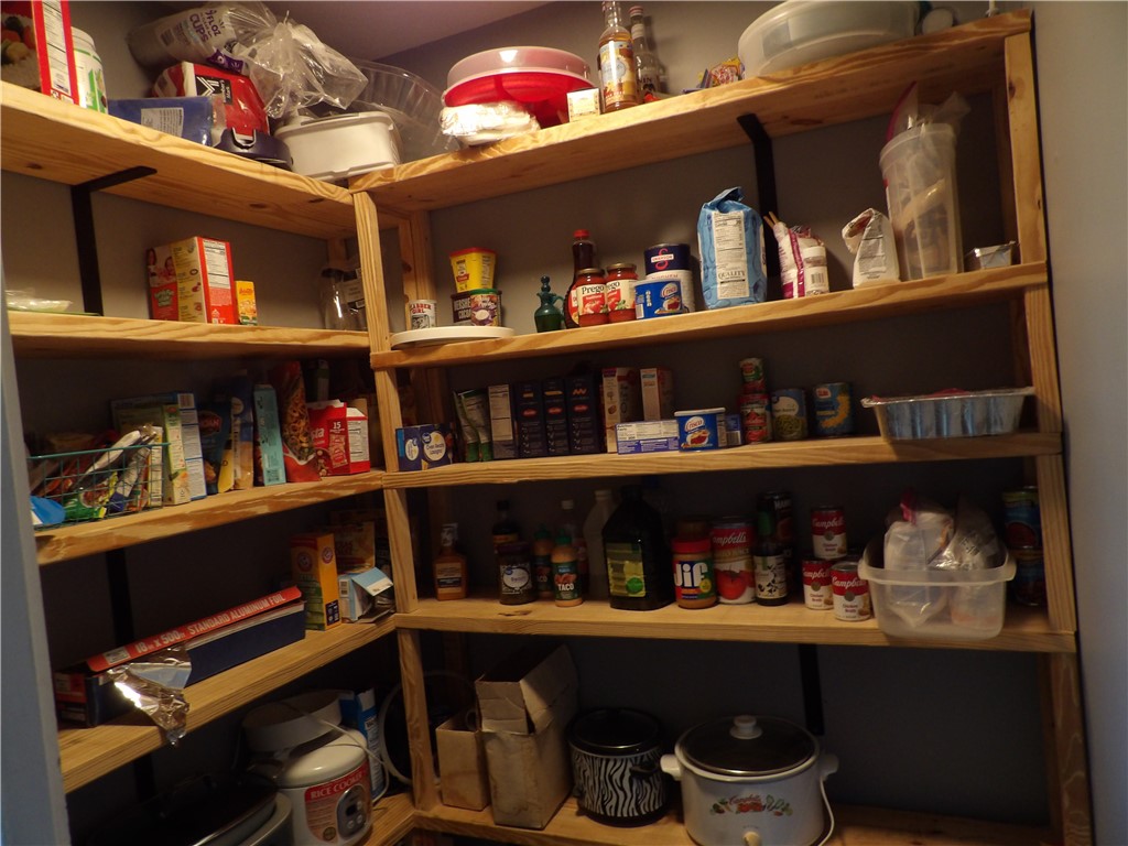 4505 North Alcony Conover Road Conover, OH 45317 - Photo 61 of 64 This spacious pantry provides ample storage with functional built-in shelving.