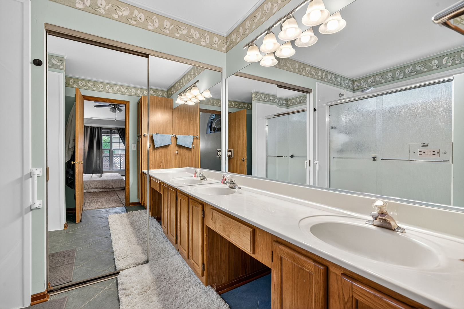 255 Braemar Bolingbrook, IL 60440 - Photo 20 of 36 a spacious bathroom with a double vanity sink mirror and shower