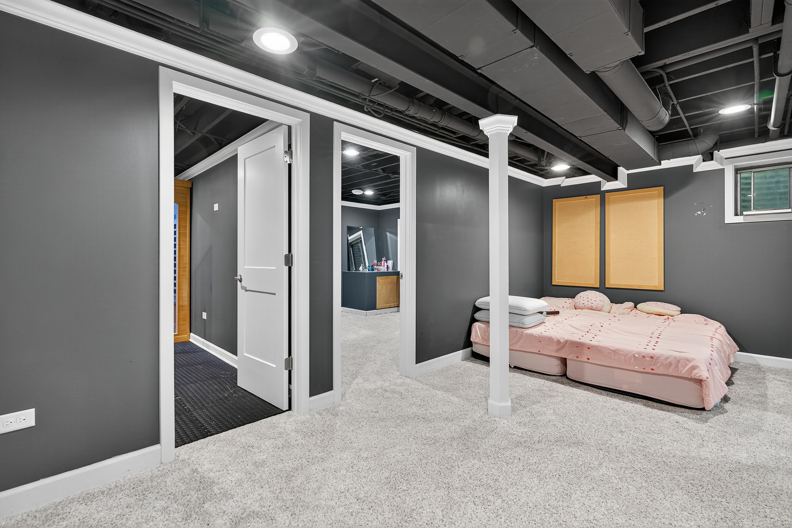 255 Braemar Bolingbrook, IL 60440 - Photo 24 of 36 a spacious bedroom with a bed and a chandelier