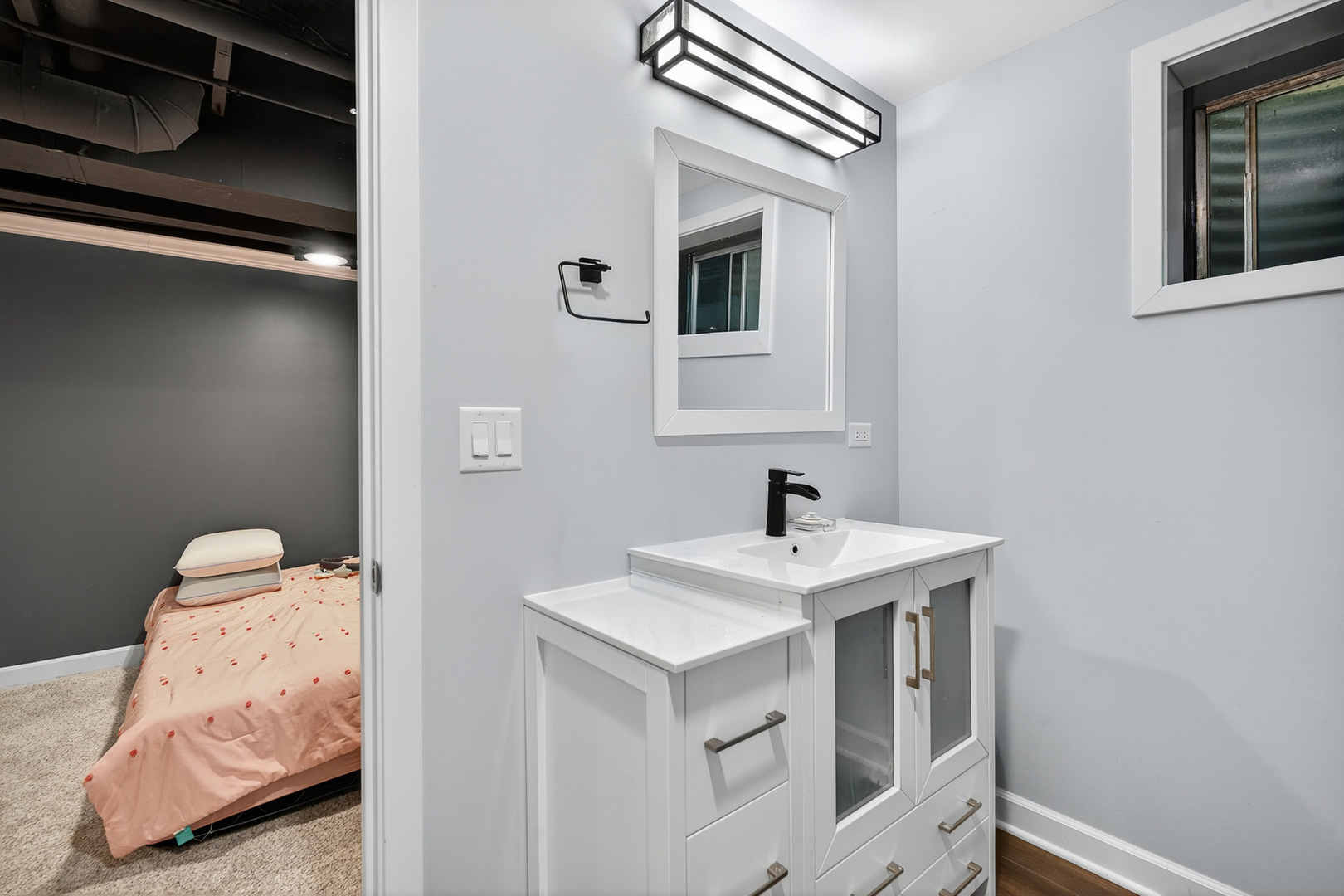 255 Braemar Bolingbrook, IL 60440 - Photo 30 of 36 a bathroom with a sink and a mirror