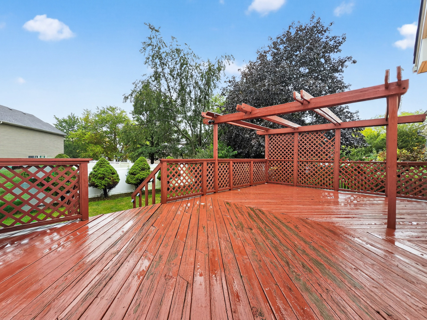 255 Braemar Bolingbrook, IL 60440 - Photo 33 of 36 a view of a wooden deck with a yard