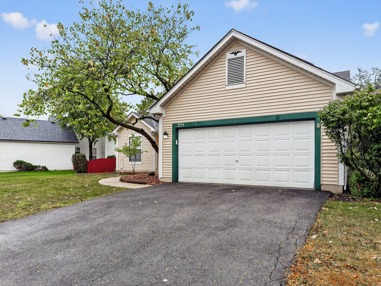 255 Braemar Bolingbrook, IL 60440 - Photo 4 of 36 a front view of a house with a yard and garage