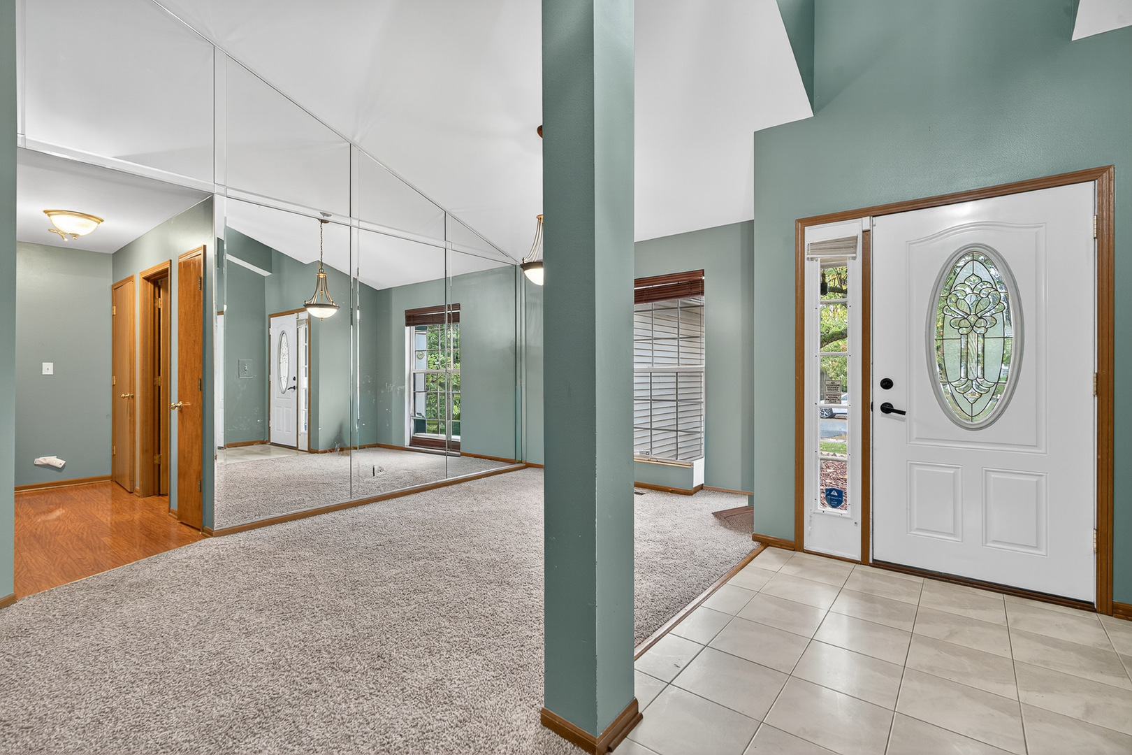 255 Braemar Bolingbrook, IL 60440 - Photo 5 of 36 a spacious bathroom with a granite countertop mirror and a shower