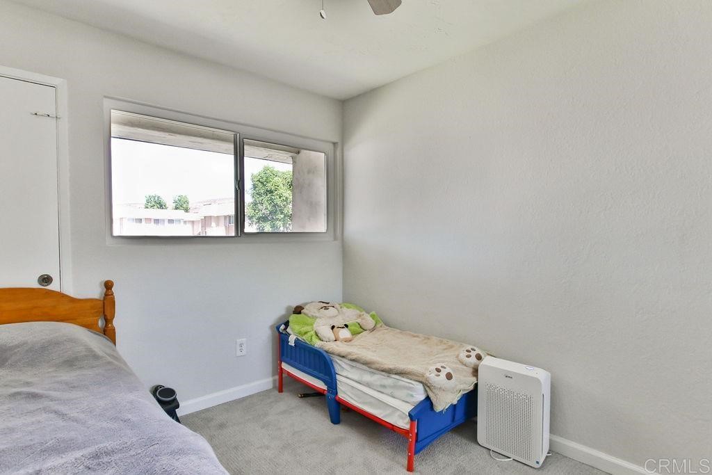 10022 Great Rock Road Santee, CA 92071 - Photo 19 of 32 a room with a bed and window