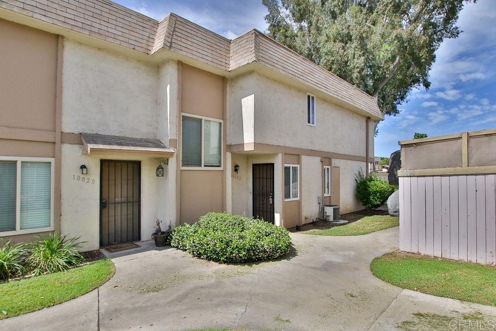 10022 Great Rock Road Santee, CA 92071 - Photo 30 of 32 a front view of a house with garden
