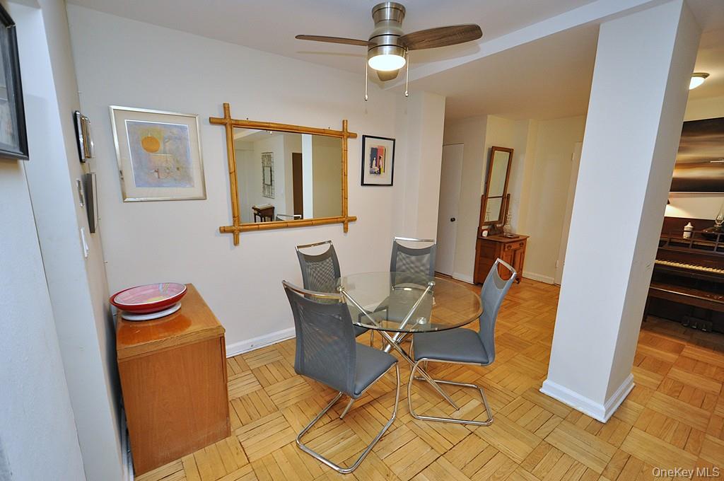 235 Garth Road, Unit A5B Scarsdale, NY 10583 - Photo 14 of 47 a living room with furniture and a window