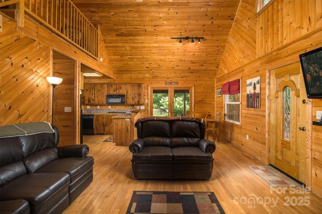 a view of a patio with a table and chairs