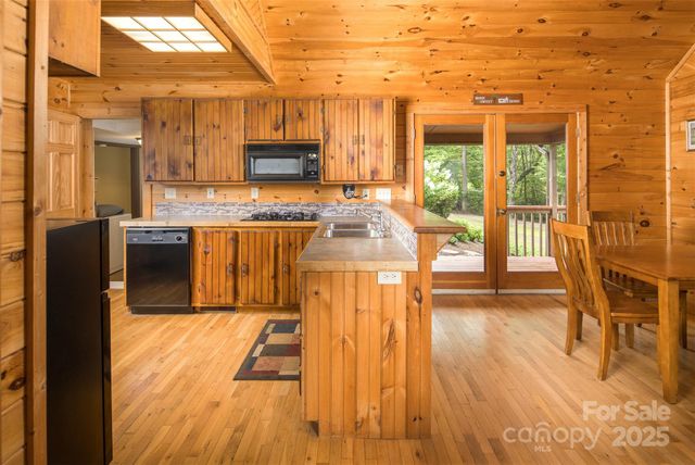 a bedroom with a bed and a table