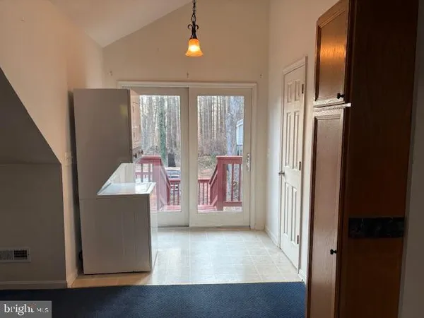 view of hall way with mirror