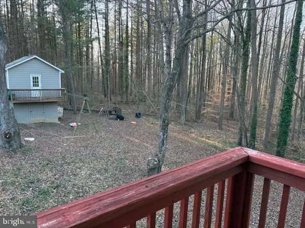 a house view with a backyard space