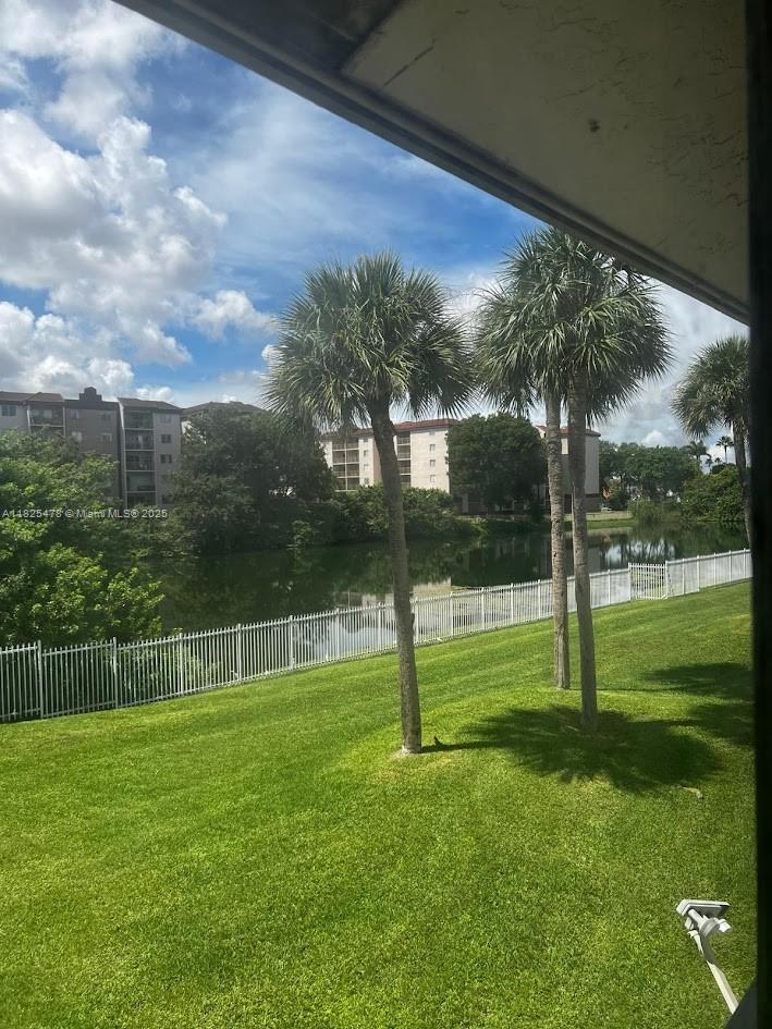 7670 Southwest 152nd Avenue, Unit 1202 Miami, FL 33193 - Photo 6 of 9 a view of a park with a big yard