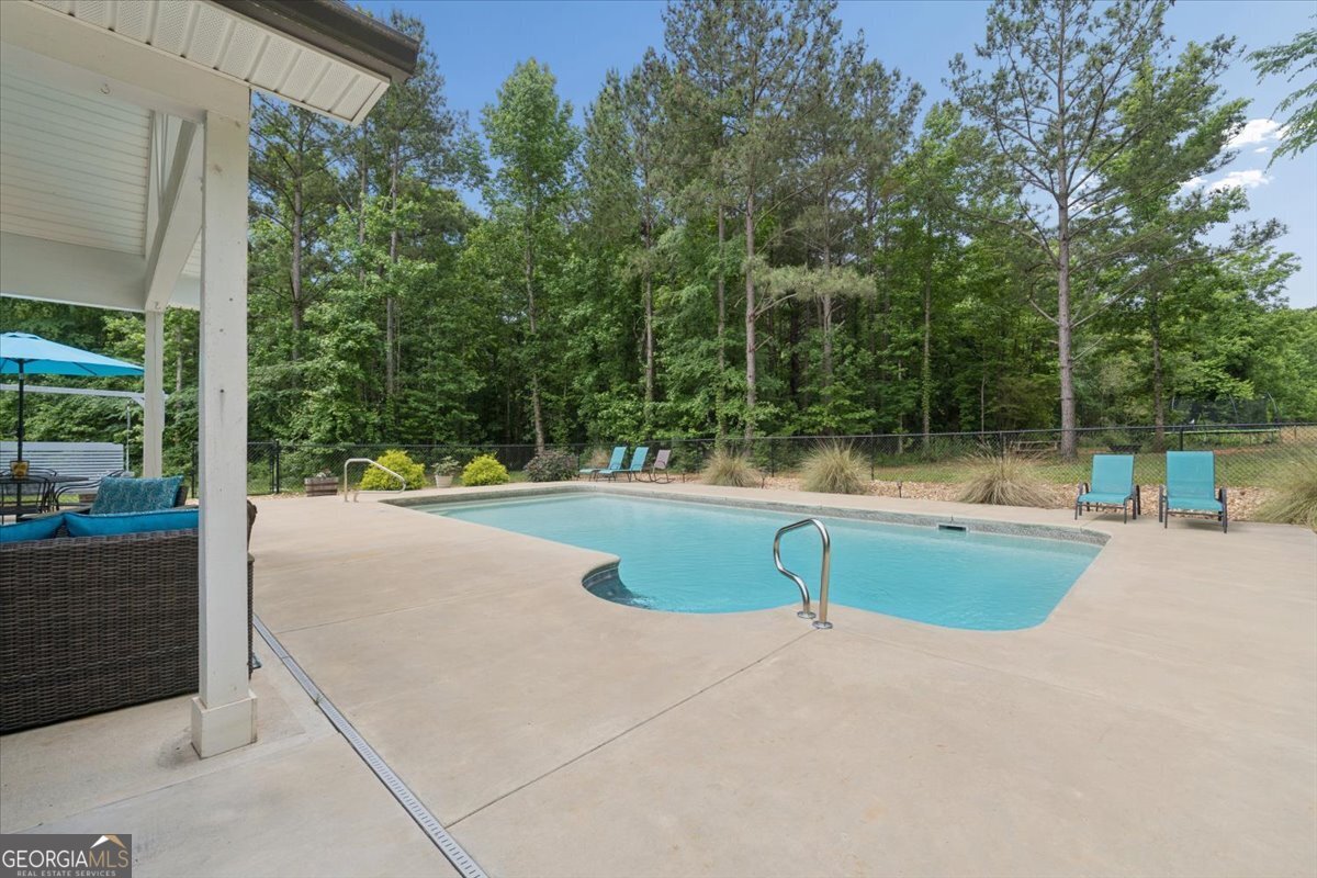 683 Teagle Road Forsyth, GA 31029 - Photo 32 of 50 a view of a backyard