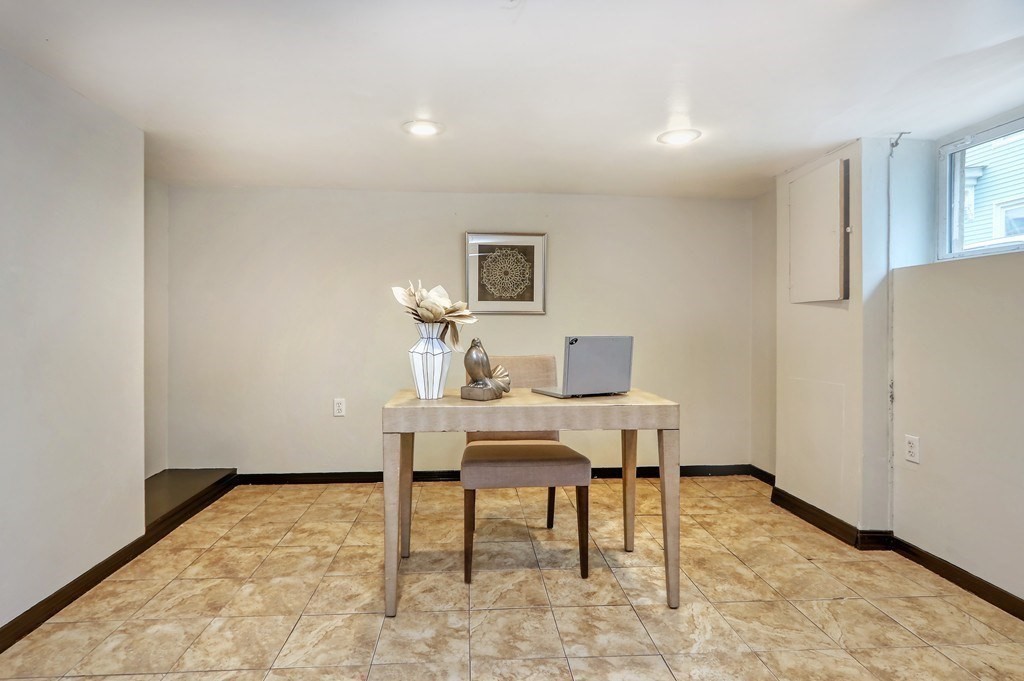 12 Jenkins Street Boston, MA 02127 - Photo 13 of 16 a workspace with furniture and a window