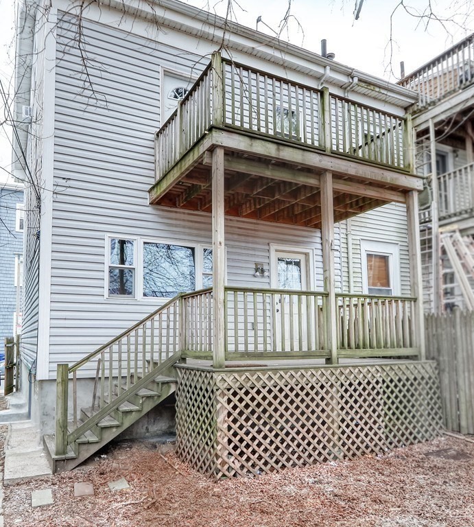 12 Jenkins Street Boston, MA 02127 - Photo 14 of 16 a view of a house with a deck