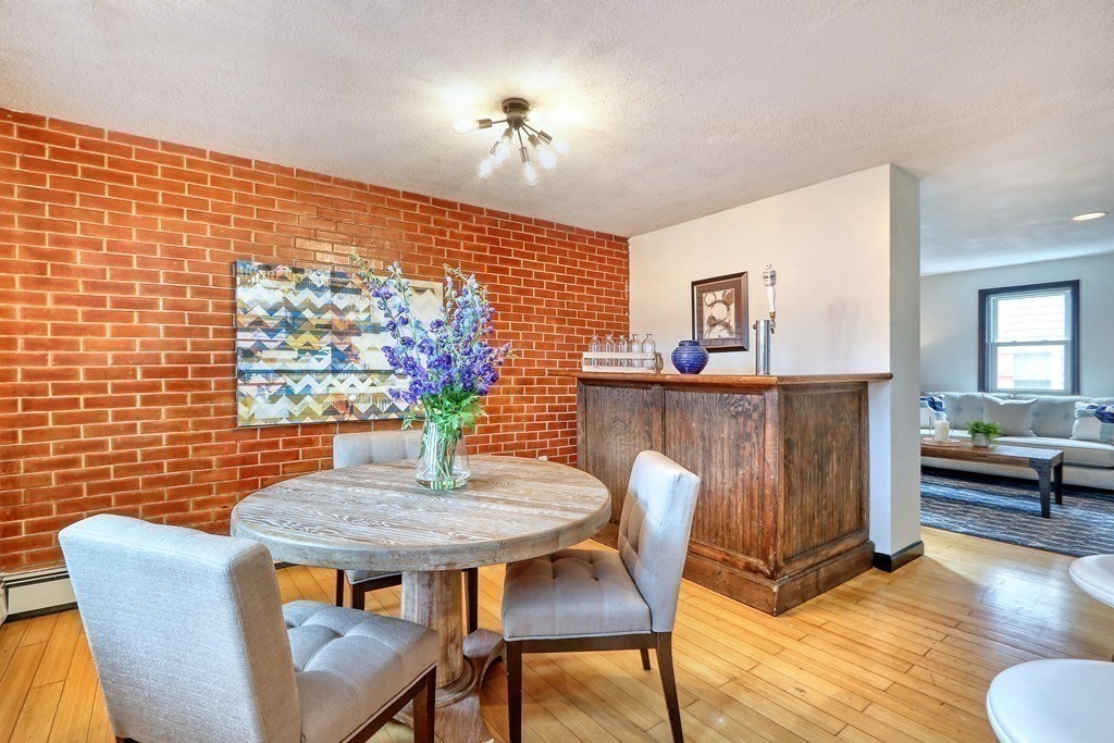 12 Jenkins Street Boston, MA 02127 - Photo 4 of 16 a dining room with furniture and window