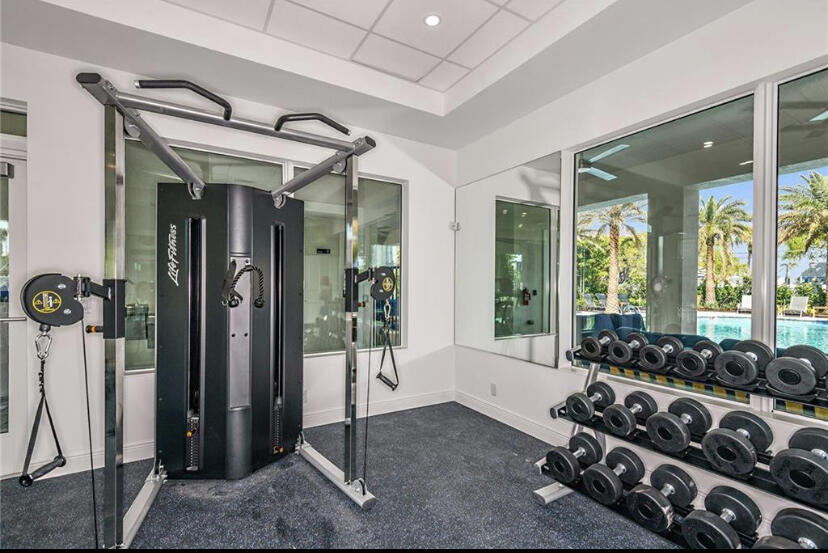 562 Parsons Way Deerfield Beach, FL 33442 - Photo 13 of 15 a view of a room with gym equipment