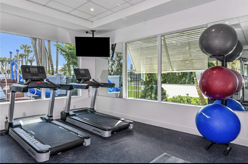 562 Parsons Way Deerfield Beach, FL 33442 - Photo 15 of 15 a room with furniture and a large window