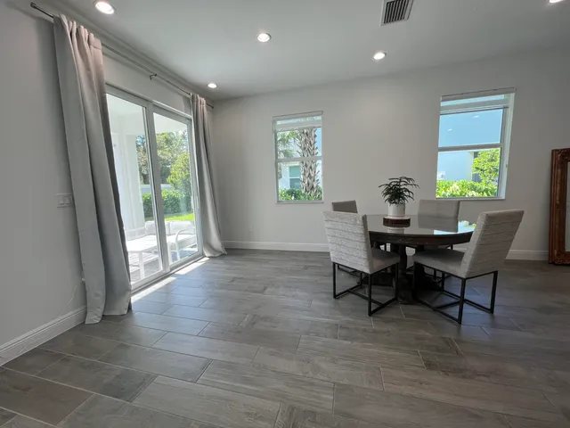 a workspace with furniture and a window