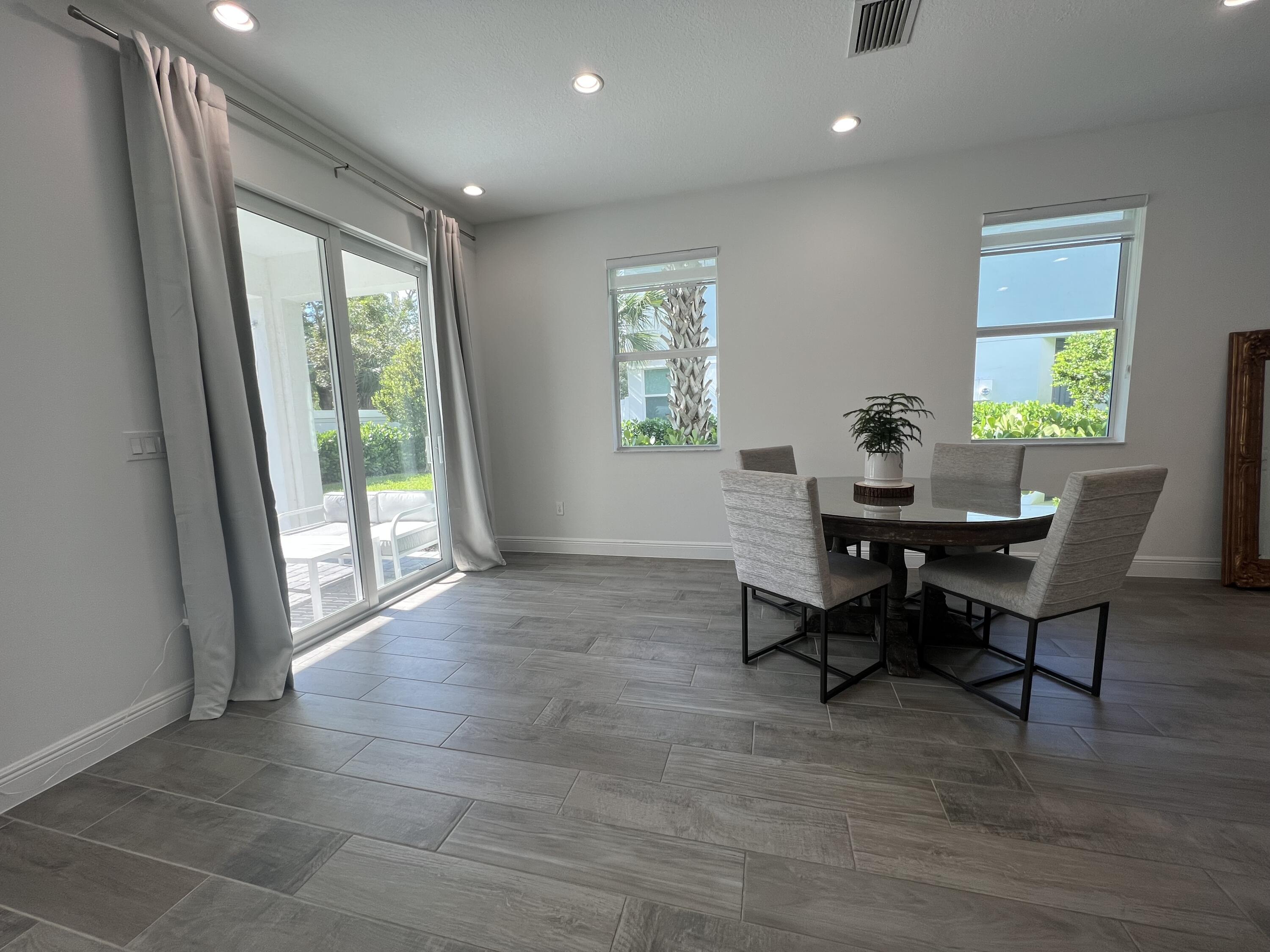 562 Parsons Way Deerfield Beach, FL 33442 - Photo 6 of 15 a workspace with furniture and a window