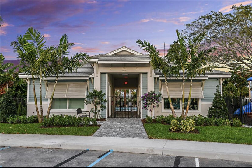 562 Parsons Way Deerfield Beach, FL 33442 - Photo 10 of 15 front view of a house with a yard