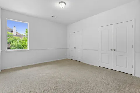 a view of hallway with an entryway