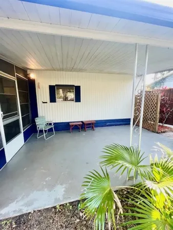 a view of empty room with windows