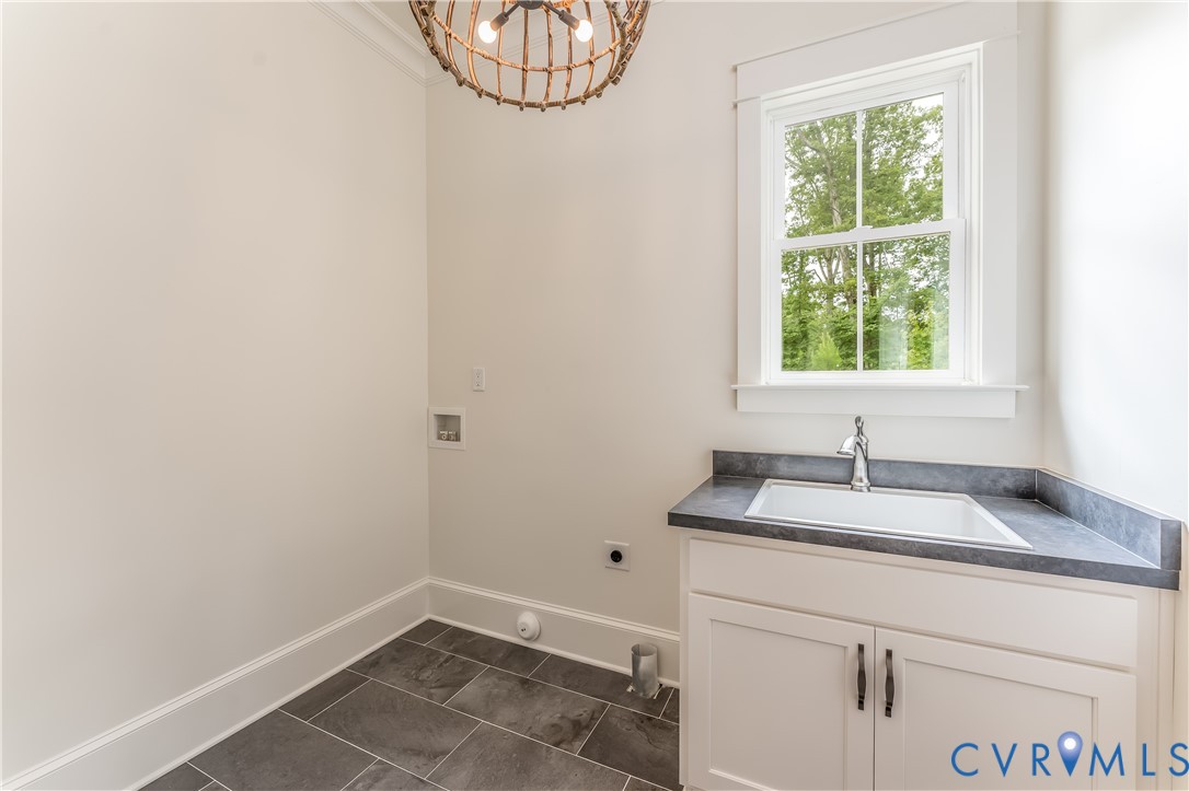 2707 North Otterdale Road Midlothian, VA 23113 - Photo 12 of 21 a bathroom with a granite countertop sink and a window