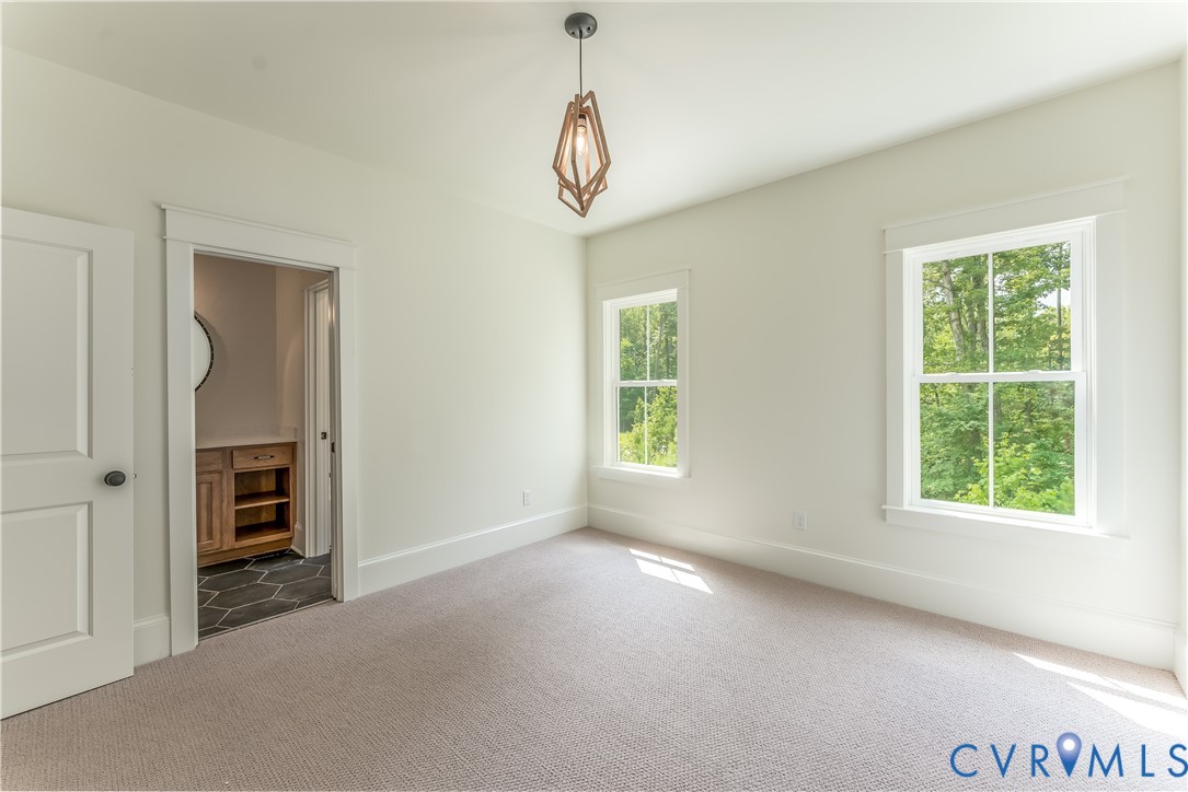 2707 North Otterdale Road Midlothian, VA 23113 - Photo 19 of 21 an empty room with windows and entrance