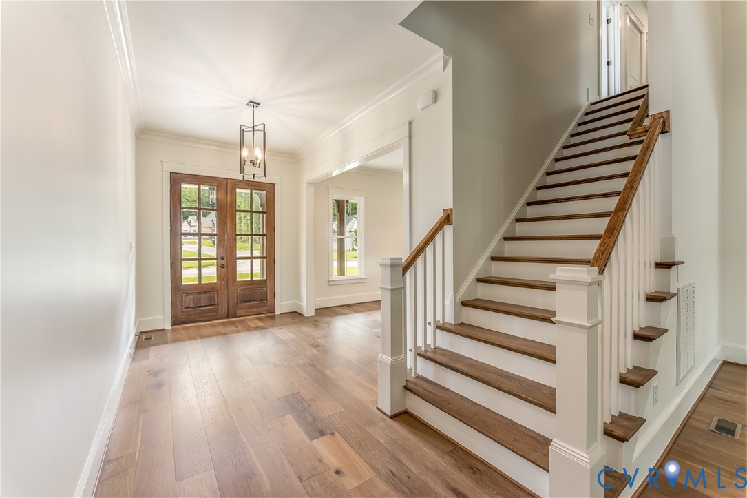 2707 North Otterdale Road Midlothian, VA 23113 - Photo 2 of 21 a view of a room with wooden floor and stairs