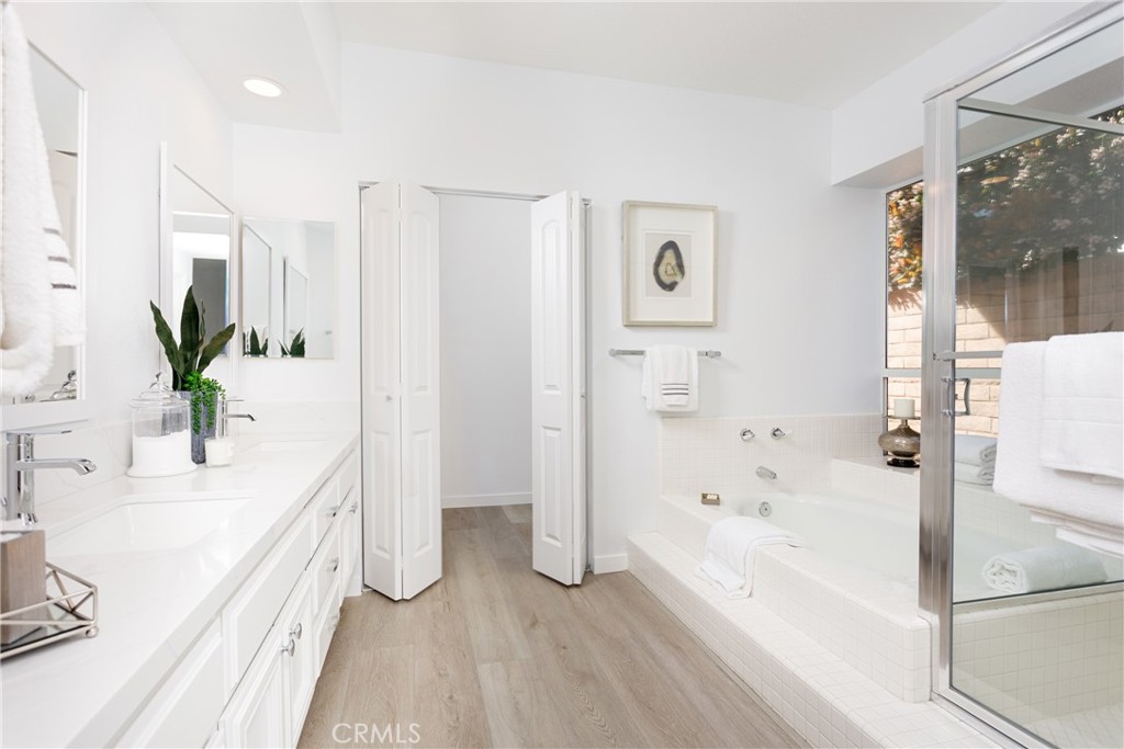 29672 Teracina Laguna Niguel, CA 92677 - Photo 17 of 35 a bathroom with a bathtub sink and mirror