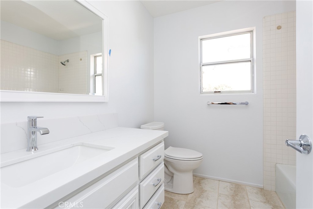 29672 Teracina Laguna Niguel, CA 92677 - Photo 20 of 35 a bathroom with a sink a toilet and a window