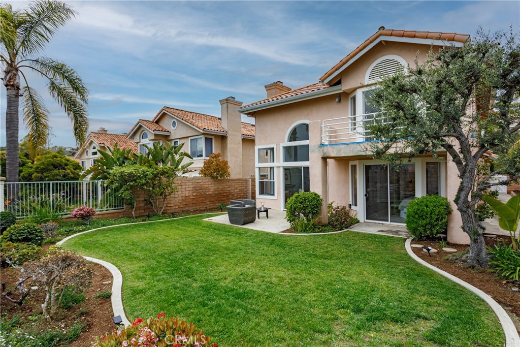 29672 Teracina Laguna Niguel, CA 92677 - Photo 32 of 35 a front view of a house with garden and porch