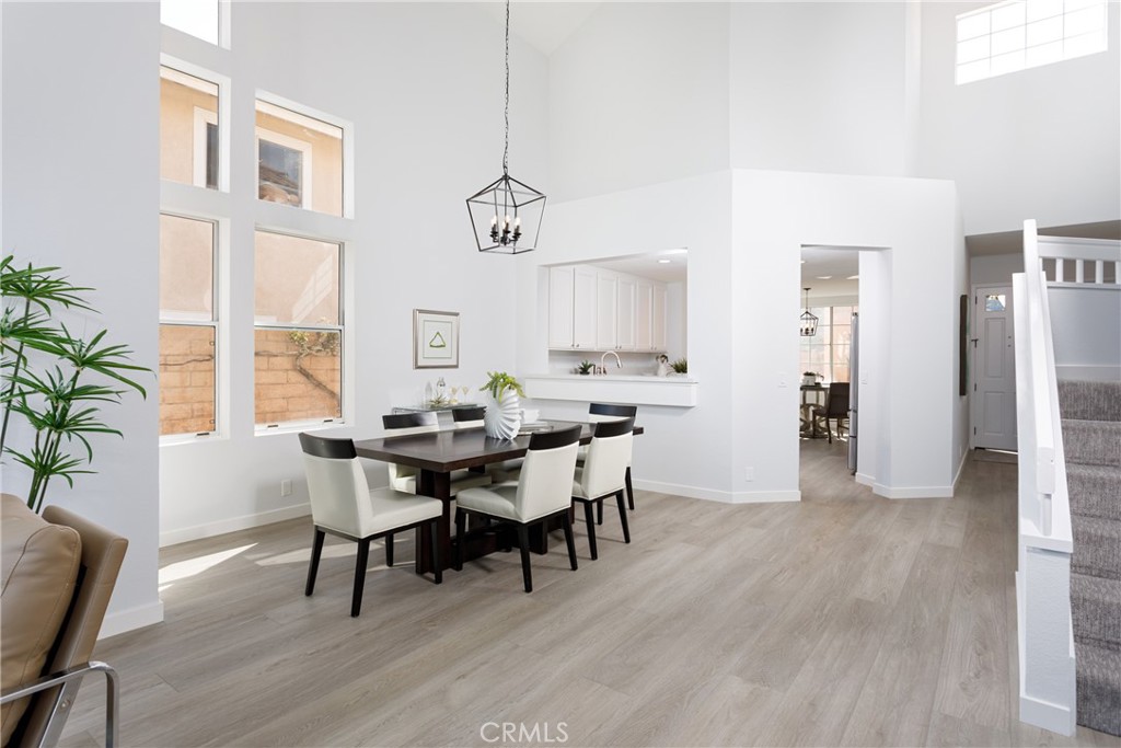 29672 Teracina Laguna Niguel, CA 92677 - Photo 7 of 35 a view of a dining room with furniture window and wooden floor