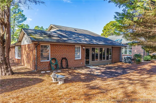 a front view of a house with a patio