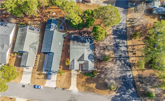 front view of a house with a street