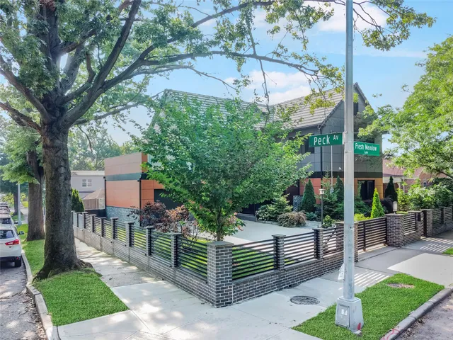 a view of a chairs and table under an umbrella