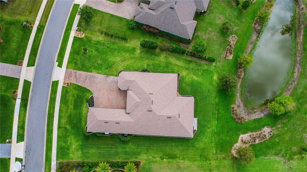 6008 Apex Way Lady Lake, FL 32159 - Photo 4 of 93 an aerial view of a house