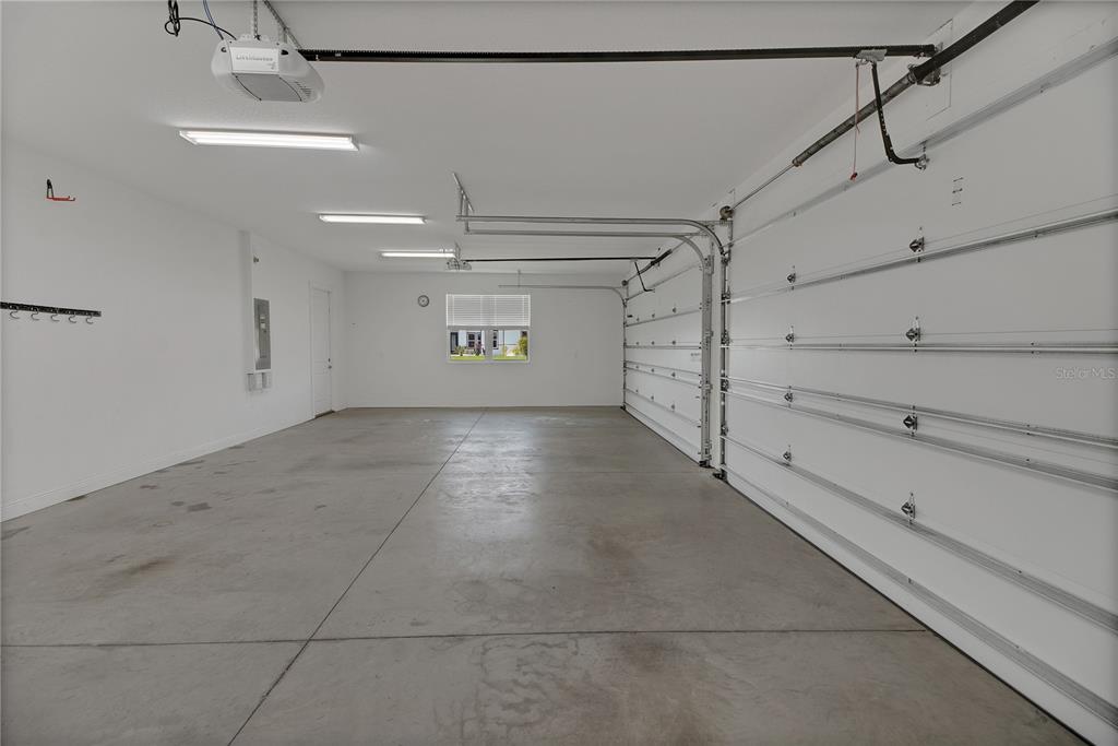 6008 Apex Way Lady Lake, FL 32159 - Photo 56 of 93 a view of a garage