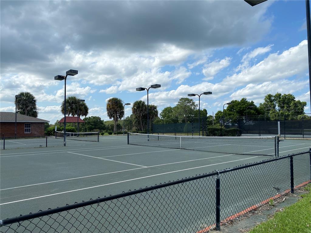 6008 Apex Way Lady Lake, FL 32159 - Photo 82 of 93 a view of a tennis court