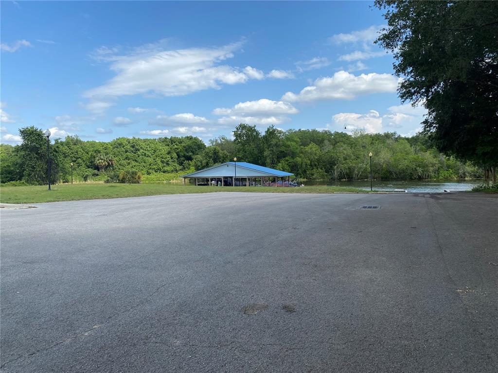 6008 Apex Way Lady Lake, FL 32159 - Photo 83 of 93 a view of a road with a yard