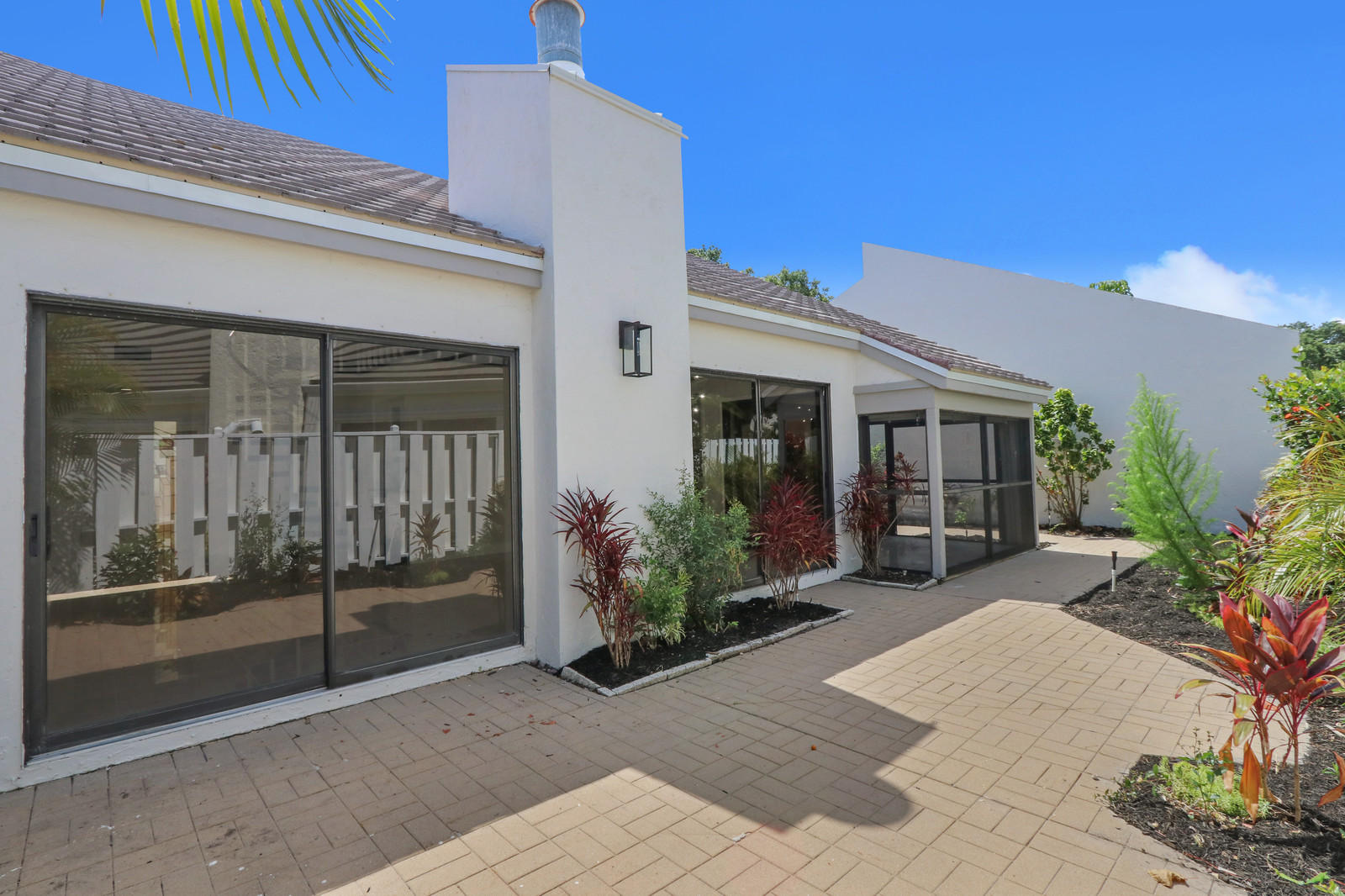 17029 Traverse Circle Jupiter, FL 33477 - Photo 24 of 30 Landscaped Rear Patio