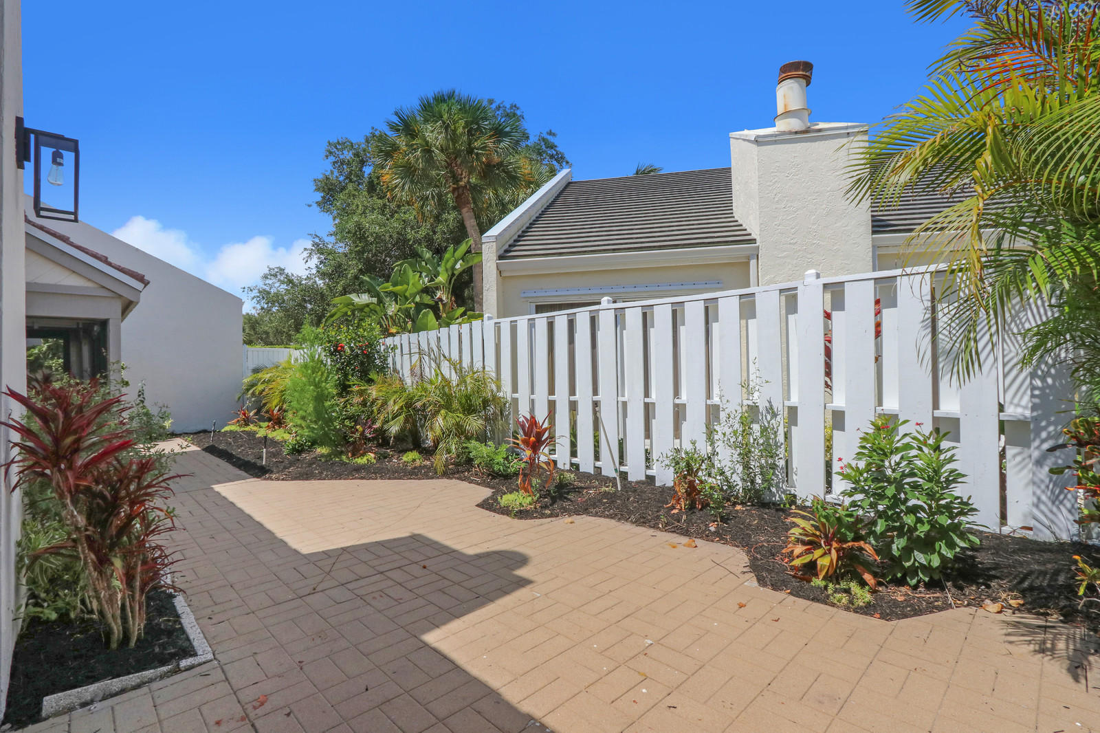 17029 Traverse Circle Jupiter, FL 33477 - Photo 25 of 30 Landscaped Rear Patio