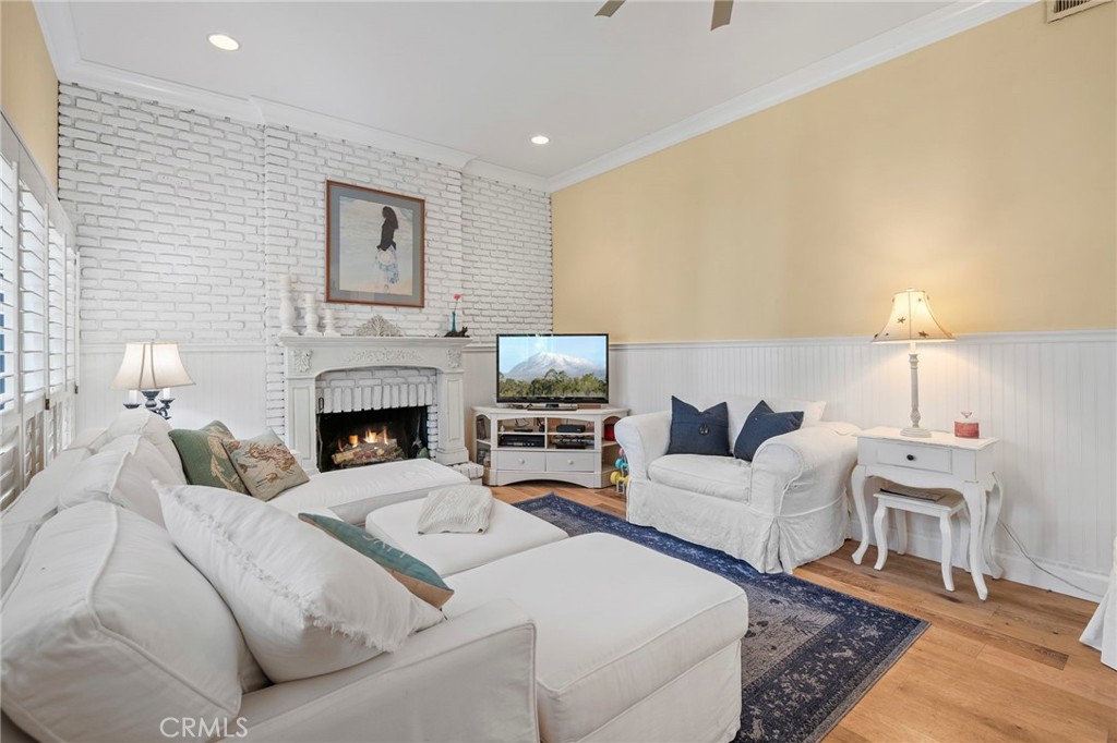 24945 Valley Rim Terrace Lake Forest, CA 92630 - Photo 15 of 52 a living room with furniture and a fireplace