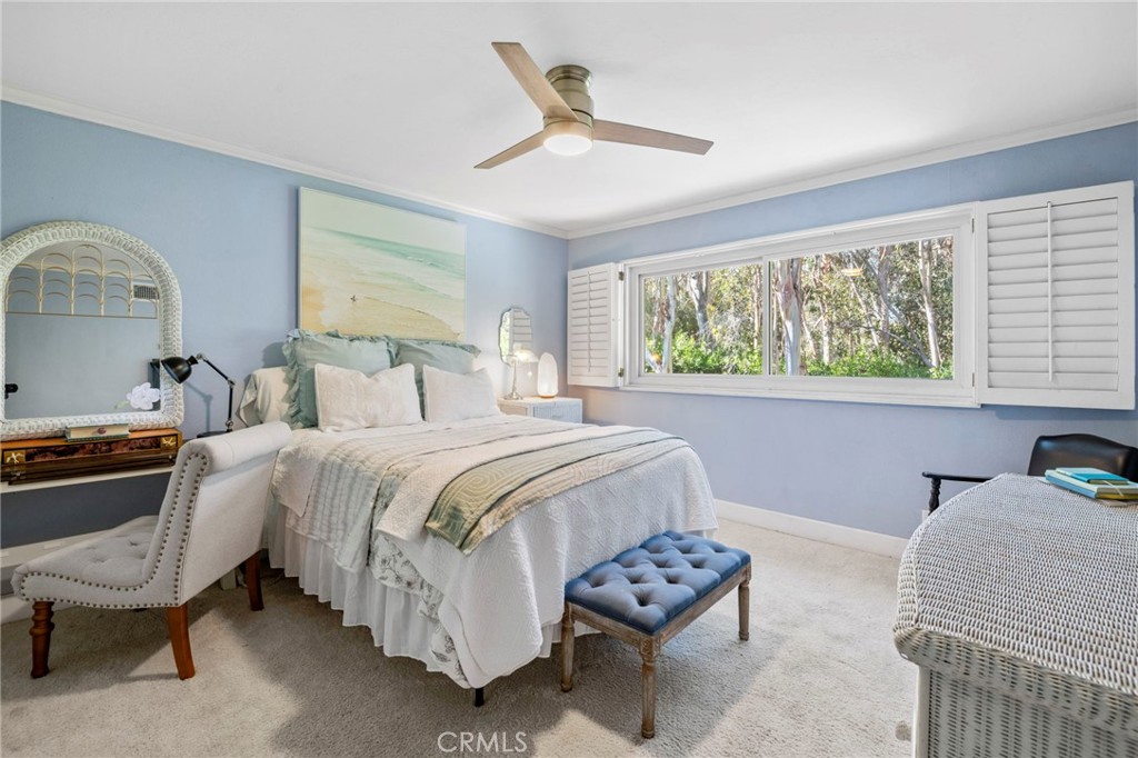 24945 Valley Rim Terrace Lake Forest, CA 92630 - Photo 30 of 52 a bedroom with a bed and a window