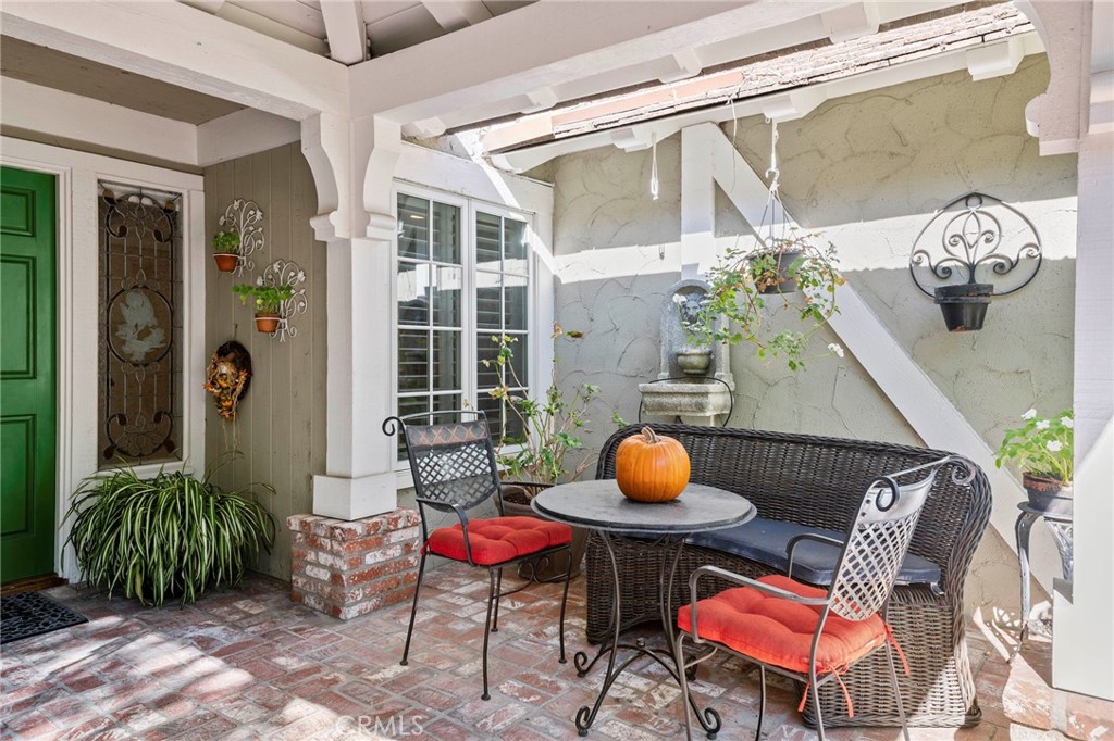 24945 Valley Rim Terrace Lake Forest, CA 92630 - Photo 3 of 52 a outdoor living area with a table and chairs