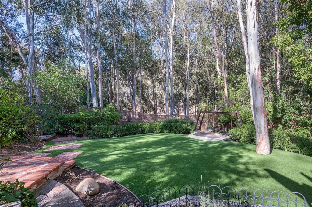 24945 Valley Rim Terrace Lake Forest, CA 92630 - Photo 39 of 52 a view of a backyard with large trees