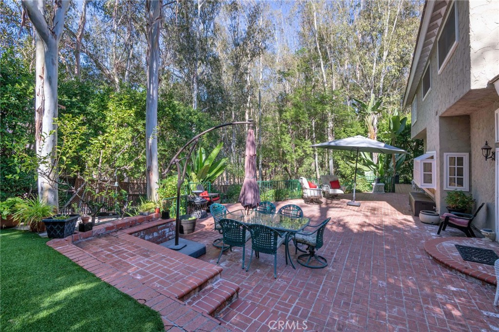 24945 Valley Rim Terrace Lake Forest, CA 92630 - Photo 43 of 52 a view of a backyard with sitting area